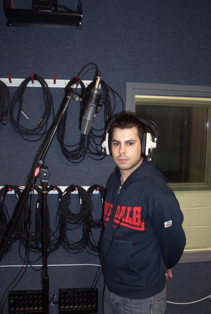 Vocalist recording in a professional music studio for the Afrobeats Starter Package